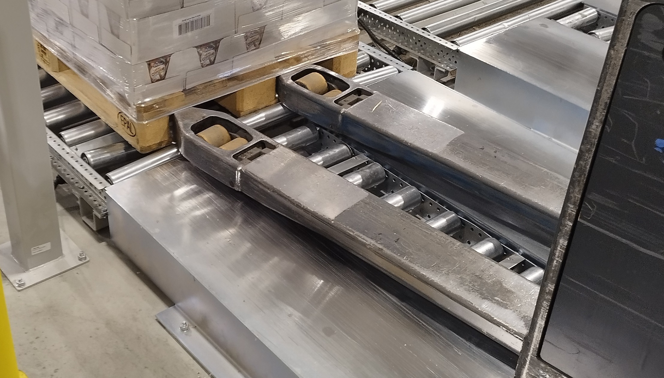 Réalisation d'une rampe fin de convoyeur gravitaire